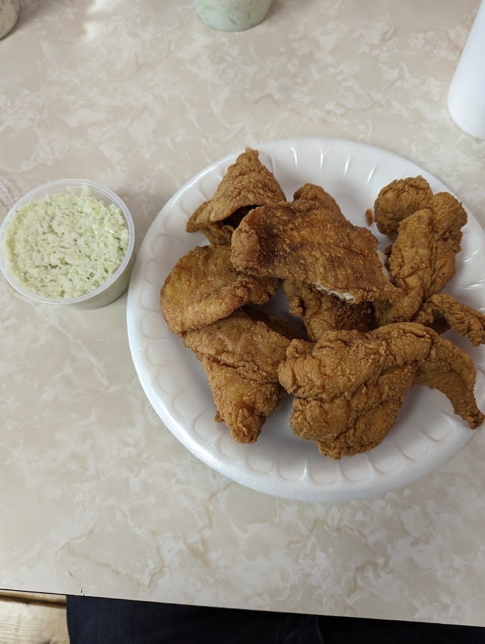 Simple menu showing seafood favorites and sides.