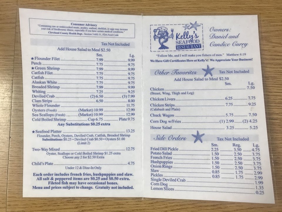 Printed seafood menu with classic fish dishes.